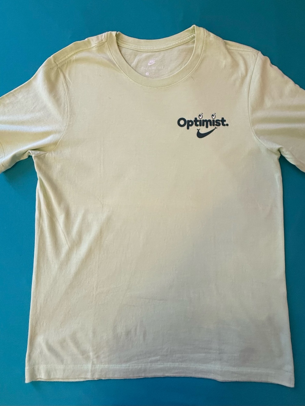 Nike Optimist Short Sleeve Crew Tee in Pale Yellow